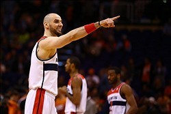 Jan 24, 2014; Phoenix, AZ, USA; Washington Wizards center Marcin Gortat reacts in the first quarter against the Phoenix Suns at the US Airways Center. Mandatory Credit: Mark J. Rebilas-USA TODAY Sports