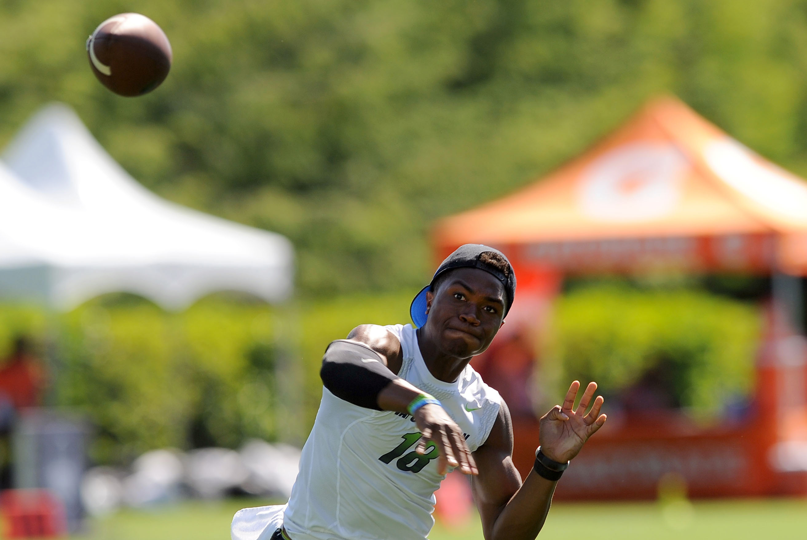 Jul 2, 2013; Beaverton, OR, USA; Jerrod Heard (18) passes the ball during the Nike 7on7 pool play at Nike World Headquarters in Beaverton, Oregon on Tuesday July, 2, 2013. Mandatory Credit: Steve Dykes-USA TODAY Sports