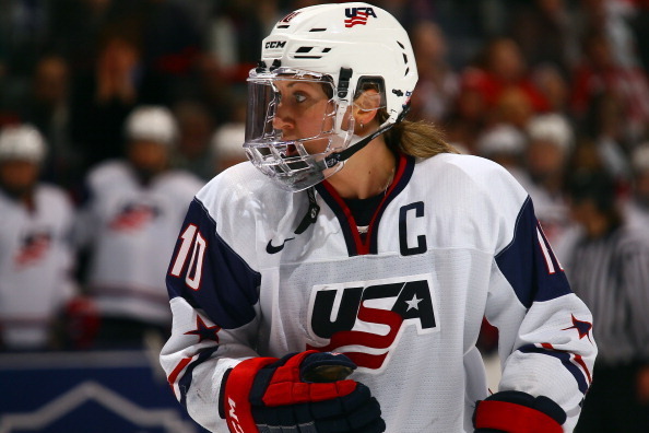 TORONTO, ON - DECEMBER 30: Meghan Duggan #10 of Team USA skates up the ice against Team Canada during a Sochi preparation game at the Air Canada Centre December 30, 2013 in Toronto, Ontario, Canada.  (Photo by Abelimages/Getty Images)