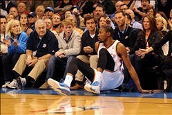 Feb 3, 2014; Oklahoma City, OK, USA;  Oklahoma City Thunder small forward Kevin Durant (35) falls into the fan seating in action against the Memphis Grizzlies at Chesapeake Energy Arena. Mandatory Credit: Mark D. Smith-USA TODAY Sports