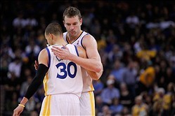 Jan 26, 2014; Oakland, CA, USA; Golden State Warriors guard Stephen Curry (30) is met by forward David Lee (10) after the Warriors scored a basket against the Portland Trail Blazers in the fourth quarter at Oracle Arena. The Warriors defeated the Trail Bl