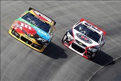 Jun 2, 2013; Dover, DE, USA; NASCAR Sprint Cup Series driver Kyle Busch (18) and Kevin Harvick (29) during the FedEx 400 Benefiting Autism Speaks at Dover International Speedway. Mandatory Credit: Matthew O'Haren-USA TODAY Sports