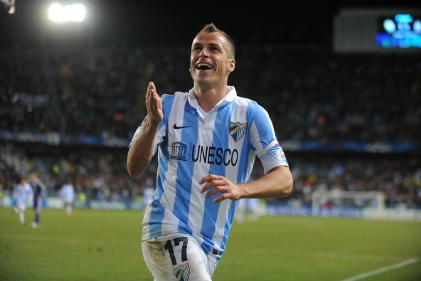 MALAGA, SPAIN - DECEMBER 04:  Sergio Duda of Malaga CF celebrates after scoring their goal during the UEFA Champions League Group C match between Malaga CF and RSC Anderlecht at Estadio La Rosaledaon December 4, 2012 in Malaga, Spain.  (Photo by Denis Doy
