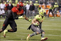 Jan 2, 2014; St. Petersburg, FL, USA; Team Highlight defensive end Myles Garrett (15) tackles Team Nitro running back Braxton Berrious (8) during the first half in the Under Armour All America football game at Tropicana Field. Mandatory Credit: Kim Klemen