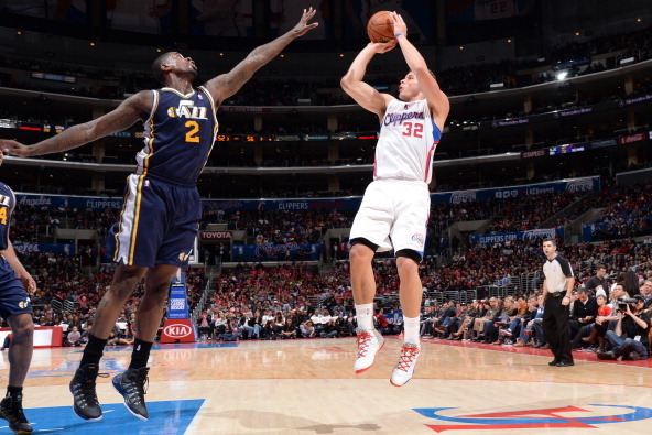 LOS ANGELES, CA - FEBRUARY 1: Blake Griffin #32 of the Los Angeles Clippers shoots against Marvin Williams #2 of the Utah Jazz at STAPLES Center on February 1, 2014 in Los Angeles, California. NOTE TO USER: User expressly acknowledges and agrees that, by 