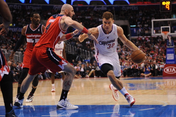 LOS ANGELES, CA - JANUARY 29: Blake Griffin #32 of the Los Angeles Clippers drives to the basket against Marcin Gortat #4 of the Washington Wizards at STAPLES Center on January 29, 2014 in Los Angeles, California. NOTE TO USER: User expressly acknowledges