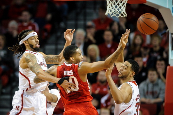 LINCOLN, NE - JANUARY 20:  LaQuinton Ross #10 of the Ohio State Buckeyes passes the ball against Walter Pitchford #35 of the Nebraska Cornhuskers during a game at Pinnacle Bank Arena on January 20, 2014 in Lincoln, Nebraska. (Photo by Eric Francis/Getty I