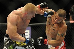 Jul 6, 2013; Las Vegas, NV, USA;  Cub Swanson and Dennis Siver during their Featherweight Bout at the MGM Grand Garden Arena. Mandatory Credit: Jayne Kamin-Oncea-USA TODAY Sports