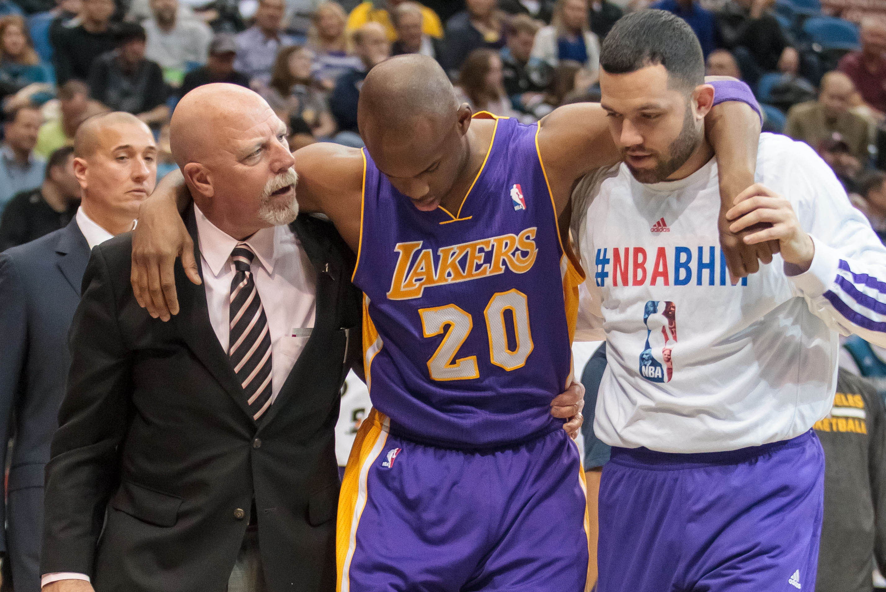 Feb 4, 2014; Minneapolis, MN, USA; Los Angeles Lakers guard Jodie Meeks (20) leaves the game in the first quarter against the Minnesota Timberwolves at Target Center. Mandatory Credit: Brad Rempel-USA TODAY Sports