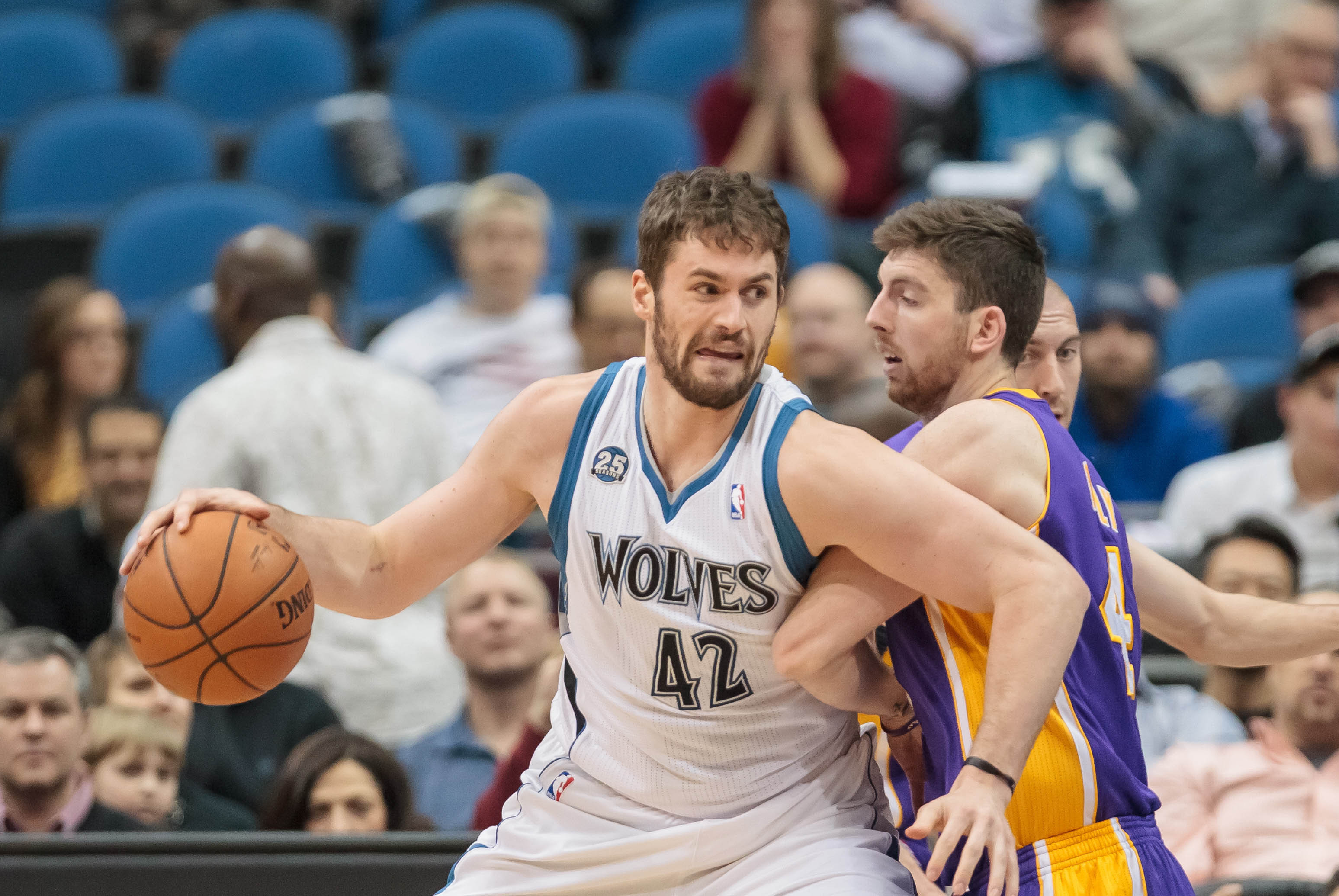Feb 4, 2014; Minneapolis, MN, USA; Minnesota Timberwolves power forward Kevin Love (42) dribbles in the first quarter against the Los Angeles Lakers at Target Center. Mandatory Credit: Brad Rempel-USA TODAY Sports