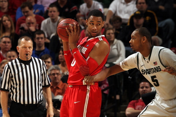 INDIANAPOLIS, IN - MARCH 11:  Jared Sullinger #0 of the Ohio State Buckeyes looks to pass against Adreian Payne #5 of the Michigan State Spartans during the Final Game of the 2012 Big Ten Men's Conference Basketball Tournament at Bankers Life Fieldhouse o