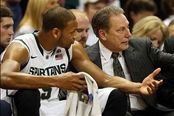 Feb. 12, 2013; East Lansing, MI, USA; Michigan State Spartans center Adreian Payne (5) talks with head coach Tom Izzo during the second half against the Michigan Wolverines at Jack Breslin Students Events Center.     Mandatory Credit: Mike Carter-USA TODA