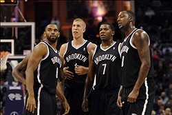 Nov 20, 2013; Charlotte, NC, USA; Brooklyn Nets guard forward Alan Anderson (6), forward center Mason Plumlee (1), guard Joe Johnson (7), and center forward Andray Blatche (0) look on as Charlotte Bobcats guard Gerald Henderson (not pictured) makes a tech