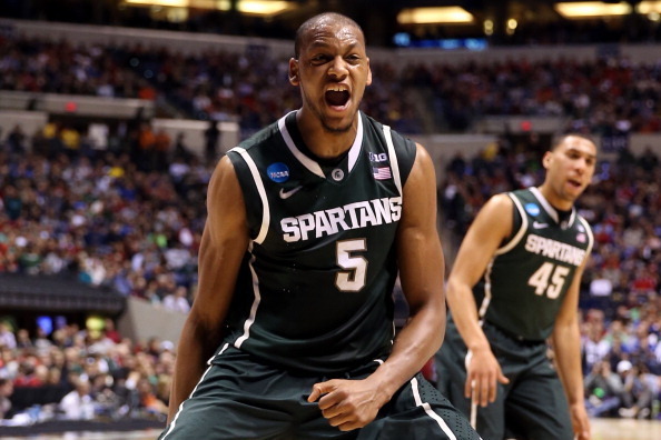 INDIANAPOLIS, IN - MARCH 29:  Adreian Payne #5 of the Michigan State Spartans reacts after he dunked in the first half against the Duke Blue Devils during the Midwest Region Semifinal round of the 2013 NCAA Men's Basketball Tournament at Lucas Oil Stadium