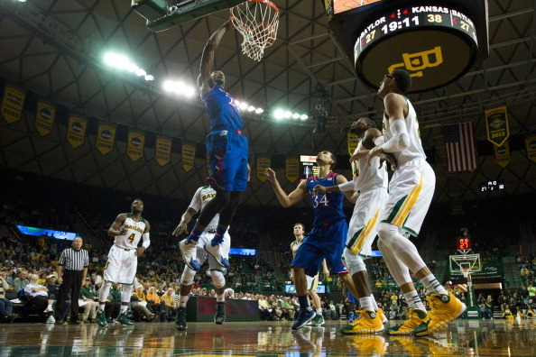 WACO, TX - FEBRUARY 04:  Joel Embiid #21 of the Kansas Jayhawks dunks the ball against the Baylor Bears on February 4, 2014 at the Ferrell Center in Waco, Texas.  (Photo by Cooper Neill/Getty Images)
