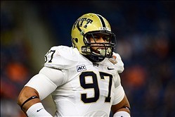 Dec 26, 2013; Detroit, MI, USA; Pittsburgh Panthers defensive lineman Aaron Donald (97) during the Little Caesars Pizza Bowl against the Bowling Green Falcons at Ford Field. Pittsburgh Panthers defeated Bowling Green Falcons 30-27. Mandatory Credit: Andre