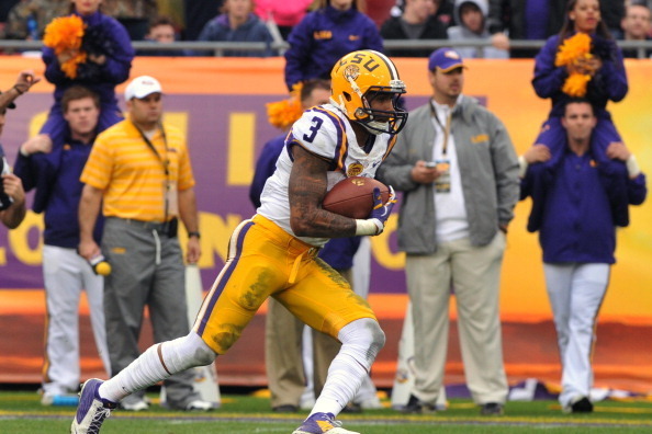 TAMPA, FL -  JANUARY 1:  Wide receiver O'Dell Beckham Jr. #3 of the LSU Tigers runs a kickoff against the Iowa Hawkeyes January 1, 2014  in the Outback Bowl at Raymond James Stadium in Tampa, Florida.  LSU won 21-14.  (Photo by Al Messerschmidt/Getty Imag