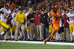 Nov 1, 2013; Corvallis, OR, USA; Oregon State Beavers wide receiver Brandin Cooks (7) races down the sideline against USC Trojans safety Leon McQuay III (22) in the second half at Reser Stadium. Mandatory Credit: Jaime Valdez-USA TODAY Sports