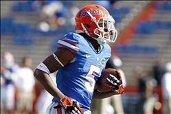 Nov 9, 2013; Gainesville, FL, USA; Florida Gators defensive back Marcus Roberson (5) against the Vanderbilt Commodores works out prior to the game at Ben Hill Griffin Stadium. Mandatory Credit: Kim Klement-USA TODAY Sports