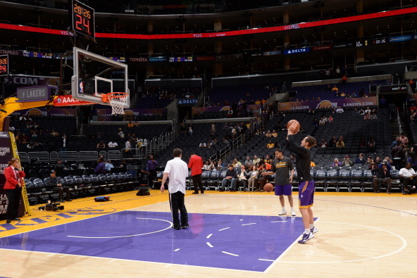 LOS ANGELES, CA - JANUARY 5: Steve Nash #10 of the Los Angeles Lakers warms up before a game against the Denver Nuggets at STAPLES Center on January 5, 2014 in Los Angeles, California. NOTE TO USER: User expressly acknowledges and agrees that, by download