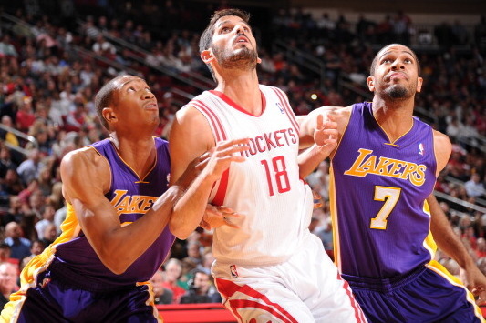 HOUSTON, TX - NOVEMBER 7: Omri Casspi #18 of the Houston Rockets battles for rebound position against the Los Angeles Lakers on November 7, 2013 at the Toyota Center in Houston, Texas. NOTE TO USER: User expressly acknowledges and agrees that, by download