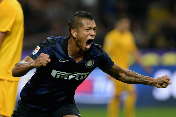 MILAN, ITALY - OCTOBER 26:  Fredy Guarin of FC Inter Milan celebrates during the Serie A match between FC Internazionale Milano and Hellas Verona at Stadio Giuseppe Meazza on October 26, 2013 in Milan, Italy.  (Photo by Claudio Villa/Getty Images)