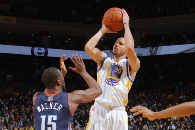 OAKLAND, CA - FEBRUARY 4: Stephen Curry #30 of the Golden State Warriors shoots against Kemba Walker #15 of the Charlotte Bobcats on February 4, 2014 at Oracle Arena in Oakland, California. NOTE TO USER: User expressly acknowledges and agrees that, by dow
