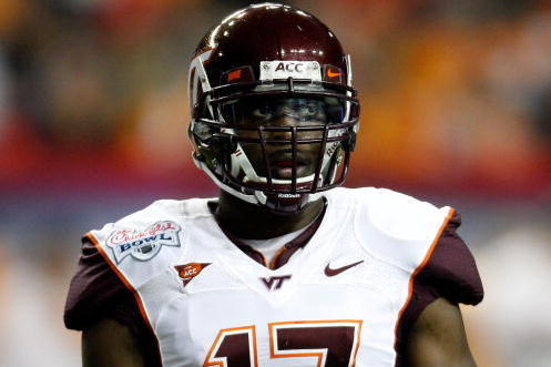 ATLANTA - DECEMBER 31:  Safety Kam Chancellor #17 of the Virginia Tech Hokies takes a break during a timeout during the Chick-Fil-A Bowl against the Tennessee Volunteers at the Georgia Dome on December 31, 2009 in Atlanta, Georgia.  Virginia Tech beat Ten
