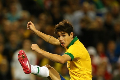 TORONTO, ON - NOVEMBER 19:  Oscar #11 of Brazil  takes the ball against Chile during a friendly match at Rogers Centre on November 19, 2013 in Toronto, Canada.  (Photo by Elsa/Getty Images)