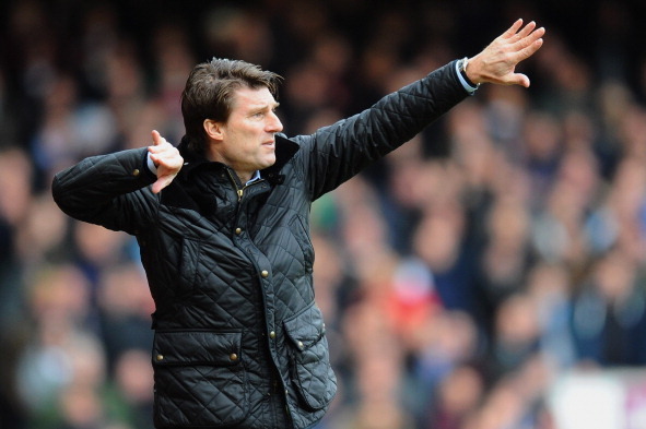 LONDON, ENGLAND - FEBRUARY 01:  Michael Laudrup manager of Swansea City signals during the Barclays Premier League match between West Ham United and Swansea City at Boleyn Ground on February 1, 2014 in London, England.  (Photo by Mike Hewitt/Getty Images)