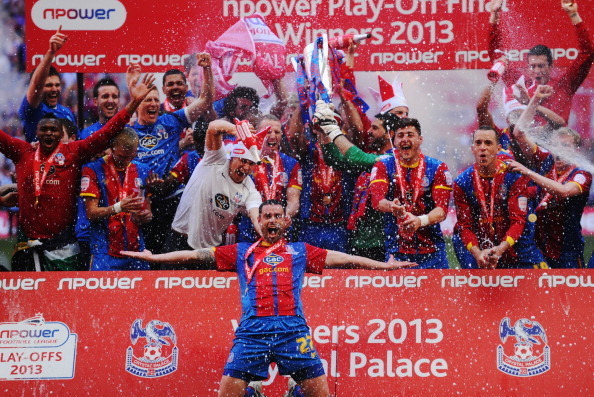 LONDON, ENGLAND - MAY 27:  Crystal Palace players celebrate victory with the trophy after the npower Championship Play-off Final match between Watford and Crystal Palace at Wembley Stadium on May 27, 2013 in London, England.  (Photo by Mike Hewitt/Getty I