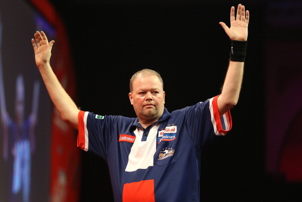 LONDON, ENGLAND - DECEMBER 20:  Raymond Van Barneveld of Holland celebrates after winning his second round match against Jamie Caven of England during the Ladbrokes.com World Darts Championship on Day Eight at Alexandra Palace on December 20, 2013 in Lond