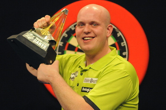 LONDON, ENGLAND - MAY 16: Michael Van Gerwen of Holland celebrates with the trophy after winning The Final against Phill Taylor of England during the McCoy's Premier League Darts Play-Offs at The O2 Arena on May 16, 2013 in London, England. (Photo by Char
