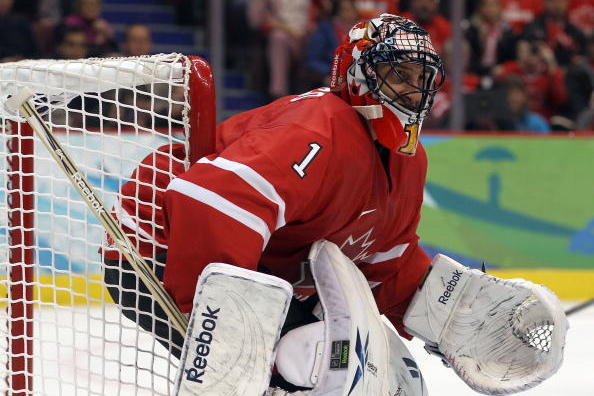 VANCOUVER, BC - FEBRUARY 23:  Goalie Roberto Luongo #1 of Canada tends goal during the ice hockey Men's Qualification Playoff game between Germany and Canada on day 12 of the Vancouver 2010 Winter Olympics at UBC Thunderbird Arena on February 23, 2010 in 