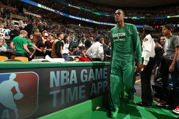BOSTON, MA - JANUARY 26:  Rajon Rondo #9 of the Boston Celtics runs out before the game against the Brooklyn Nets at TD Garden in Boston. NOTE TO USER: User expressly acknowledges and agrees that, by downloading and or using this photograph, User is conse
