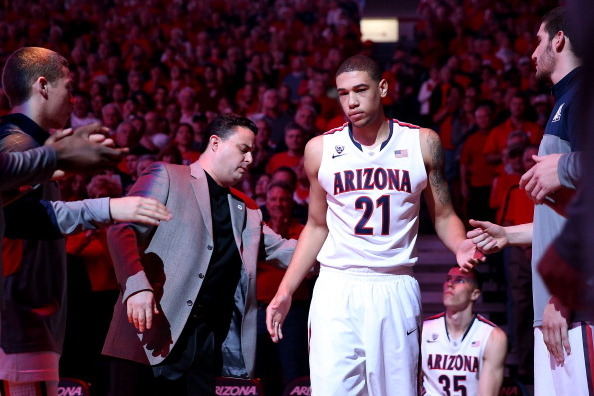 TUCSON, AZ - JANUARY 26:  Brandon Ashley #21 of the Arizona Wildcats is introduced before the college basketball game against the Utah Utes at McKale Center on January 26, 2014 in Tucson, Arizona. The Wildcats defeated the Utes 65-56.  (Photo by Christian