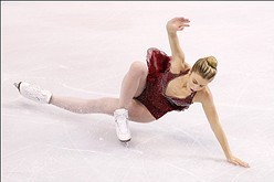 Jan 11, 2014; Boston, MA, USA;  Ashley Wagner falls during the Ladies Free Skate at the TD Garden. Mandatory Credit: Winslow Townson-USA TODAY Sports