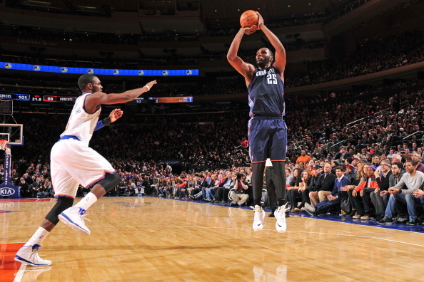 NEW YORK - JANUARY 24:   Al Jefferson #25 of the Charlotte Bobcats shoots the ball against the New York Knicks on January 24, 2014 at Madison Square Garden in New York City. NOTE TO USER: User expressly acknowledges and agrees that, by downloading and or 