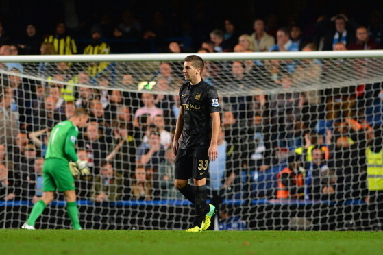 LONDON, ENGLAND - OCTOBER 27:  Matija Nastasic of Manchester City reacts after Fernando Torres of Chelsea (not pictured) scored their seocnd goal during the Barclays Premier League match between Chelsea and Manchester City at Stamford Bridge on October 27