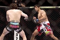Jan 15, 2014; Duluth, GA, USA; Charlie Brenneman (red gloves) fights with Beneil Dariush (blue gloves) during UFC Fight Night at Gwinnett Center. Dariush won. Mandatory Credit: Joshua S. Kelly-USA TODAY Sports