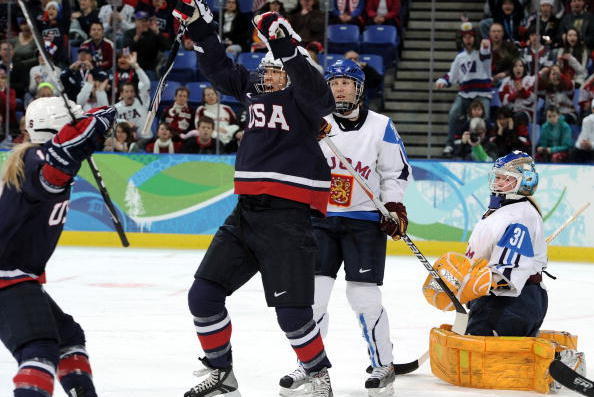 VANCOUVER, BC - FEBRUARY 18:  Julie Chu of The United States celebrates scoring their first goal during the ice hockey women's preliminary game between USA and Finland on day 7 of the 2010 Vancouver Winter Olympics at UBC Thunderbird Arena on February 18,