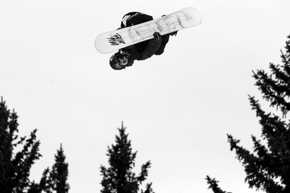 ASPEN, CO - JANUARY 26:  (EDITORS NOTE: Image has been converted to black and white.) Max Parrot of Canada soars through the air en route to second place in the Men's Snowboard Slopestyle during Winter X Games Aspen 2013 at Buttermilk Mountain on January 