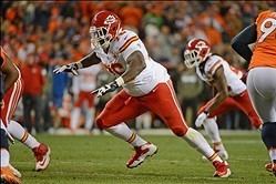 November 17, 2013; Denver, CO, USA; Kansas City Chiefs tackle Branden Albert (76) blocks during the second quarter against the Denver Broncos at Sports Authority Field at Mile High. The Broncos defeated the Chiefs 27-17. Mandatory Credit: Kyle Terada-USA