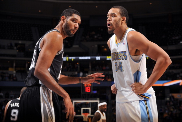 DENVER, CO - NOVEMBER 5:  Tim Duncan #21 of the San Antonio Spurs and JaVale McGee #34 of the Denver Nuggets during the game on November 5, 2013 at the Pepsi Center in Denver, Colorado. NOTE TO USER: User expressly acknowledges and agrees that, by downloa