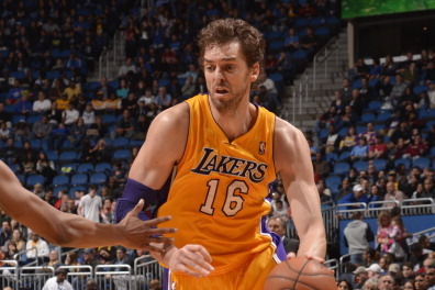 ORLANDO, FL - JANUARY 24: Pau Gasol #16 of the Los Angeles Lakers drives to the basket against the Orlando Magic on January 24, 2014 at Amway Center in Orlando, Florida. NOTE TO USER: User expressly acknowledges and agrees that, by downloading and or usin