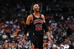 Feb 4, 2014; Phoenix, AZ, USA; Chicago Bulls forward Taj Gibson (22) reacts on the court against the Phoenix Suns in the first half at US Airways Center. The Bulls won 101-92.  Mandatory Credit: Jennifer Stewart-USA TODAY Sports