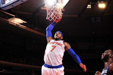 NEW YORK - JANUARY 24:  Carmelo Anthony #7 of the New York Knicks dunks against the Charlotte Bobcats on January 24, 2014 at Madison Square Garden in New York City. NOTE TO USER: User expressly acknowledges and agrees that, by downloading and or using thi