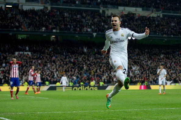 MADRID, SPAIN - FEBRUARY 05: Jese Rodriguez of Real Madrid CF jumps celebrating scoring their second goal during the Copa del Rey semifinal first leg match between Real Madrid CF and Club Atletico Madrid at Estadio Santiago Bernabeu on February 5, 2014 in