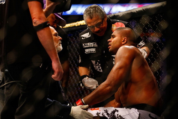 BOSTON, MA - AUGUST 17: Alistair Overeem sits in the corner and is tended to by medical staff after being knocked out by Travis Browne in their heavyweight bout at TD Garden on August 17, 2013 in Boston, Massachusetts. (Photo by Jared Wickerham/Getty Imag