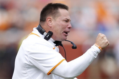 KNOXVILLE, TN - OCTOBER 19: Head coach Butch Jones of the Tennessee Volunteers celebrates after a touchdown by his team in the first half of the game against the South Carolina Gamecocks at Neyland Stadium on October 19, 2013 in Knoxville, Tennessee. (Pho